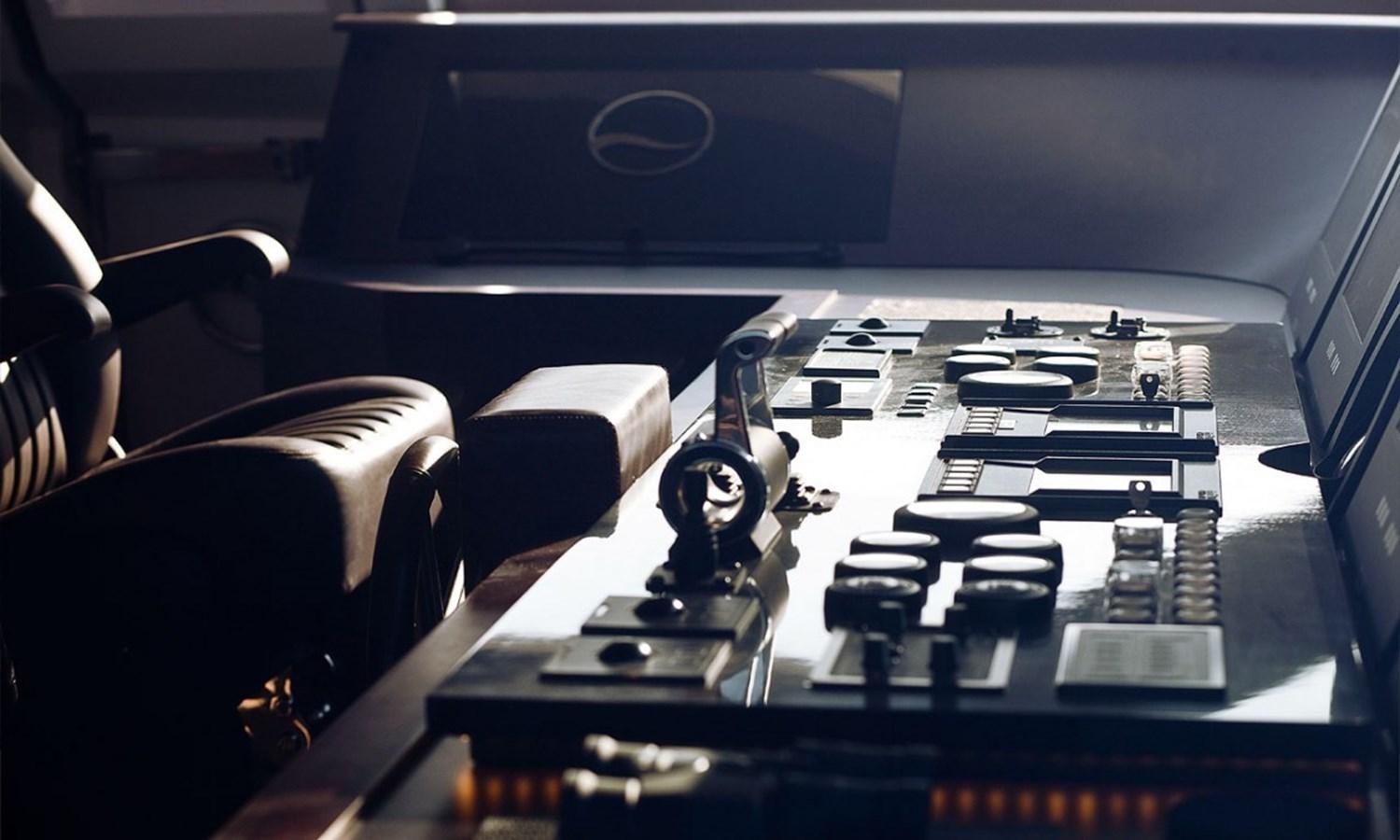 a room with a large table with many small laptops on it aboard PATRIOT 41 Yacht for Sale