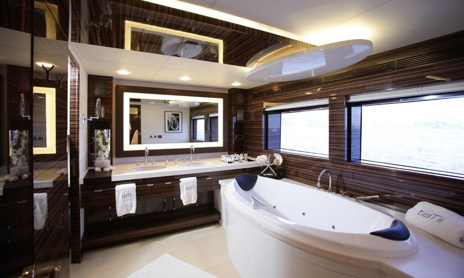 a bathroom with a large jacuzzi tub aboard PATRIOT 41 Yacht for Sale