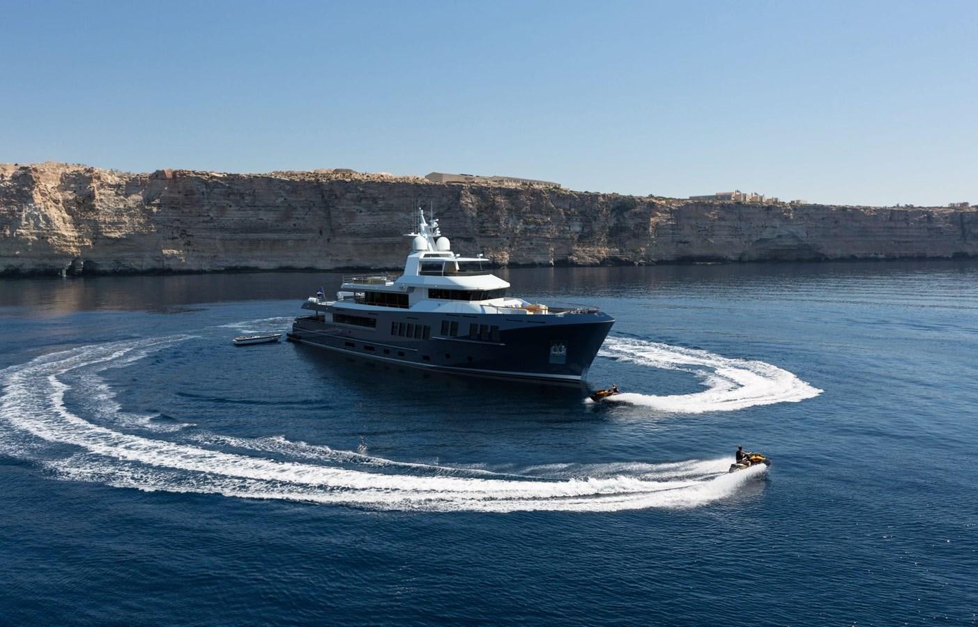 a boat on the water aboard BERING B130 Yacht for Sale