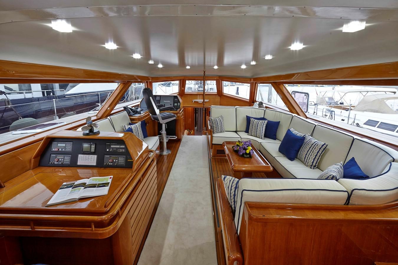a room with a couch and a desk aboard MIRABELLA Yacht for Sale