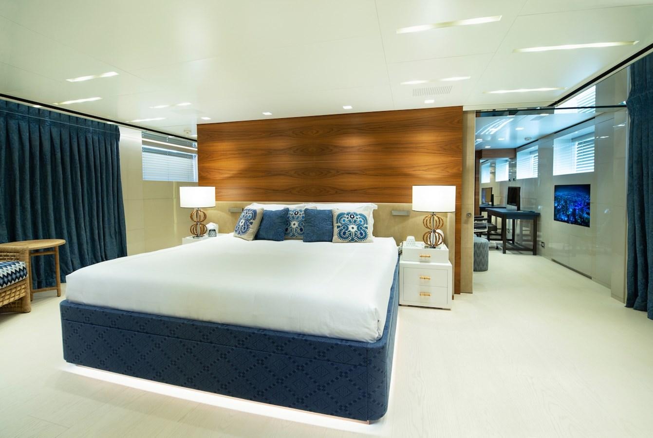 a bedroom with a large bed aboard ASTERI Yacht for Sale