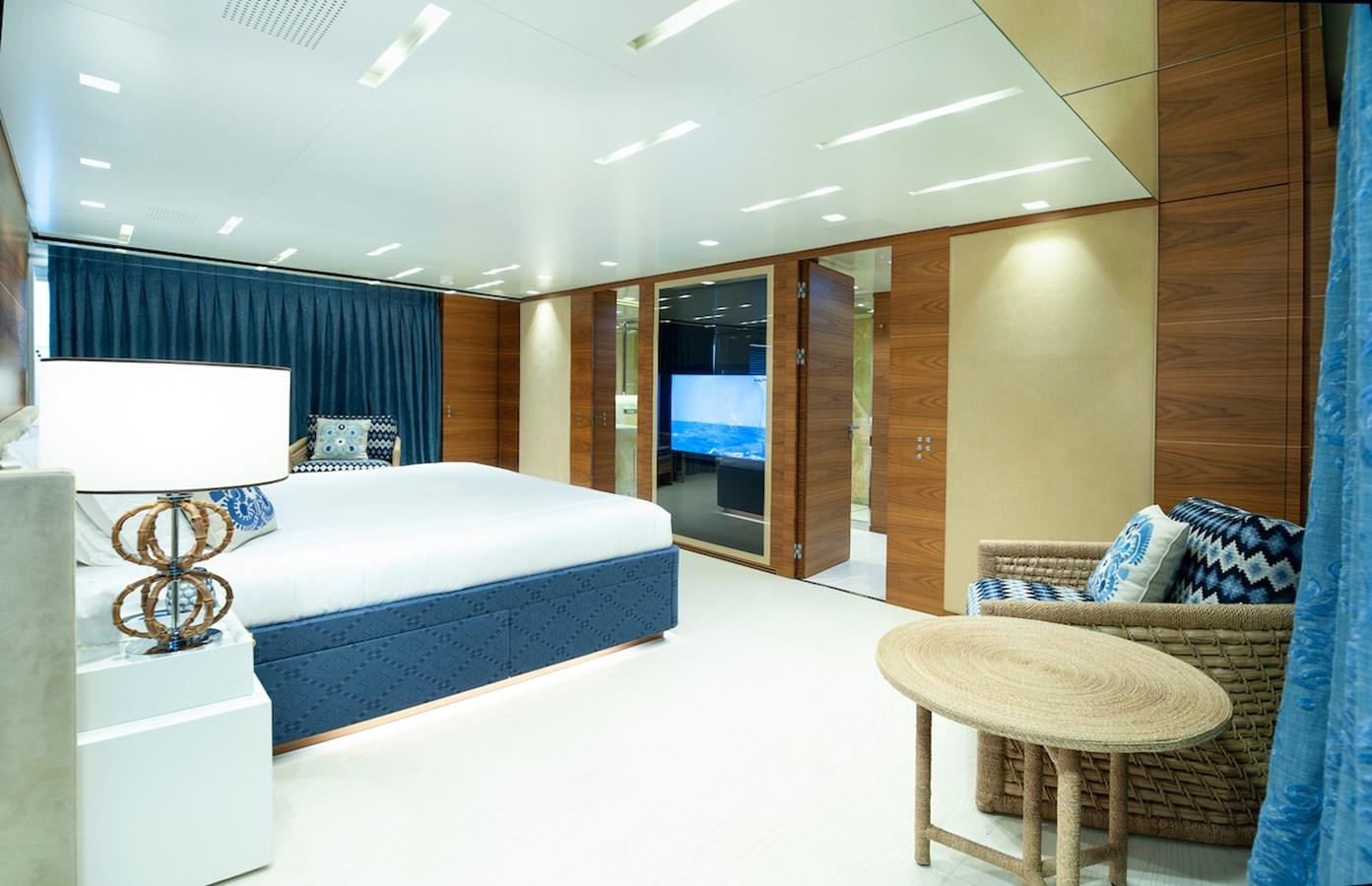 a room with a bed and a table aboard ASTERI Yacht for Sale