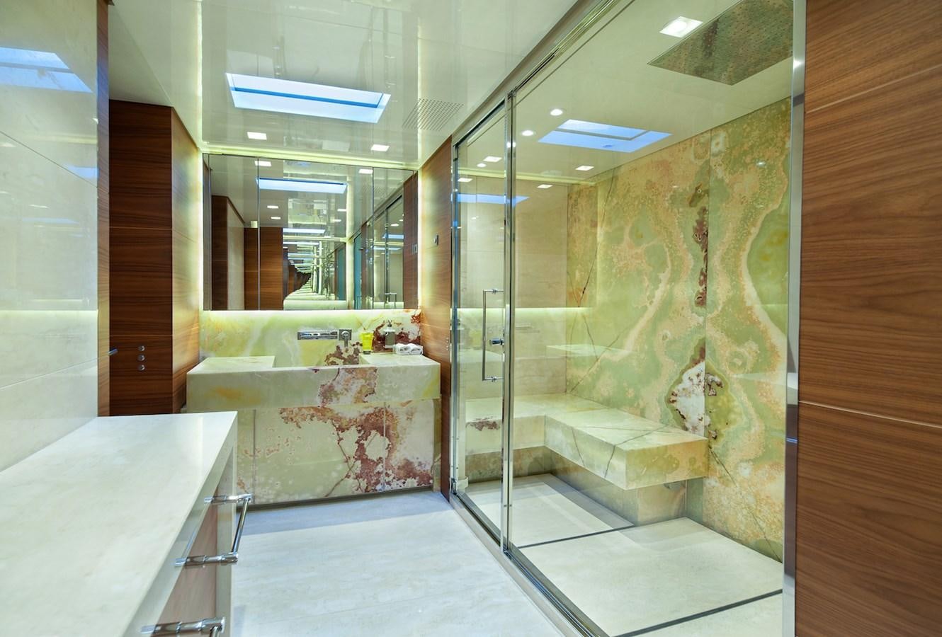 a bathroom with a glass shower aboard ASTERI Yacht for Sale