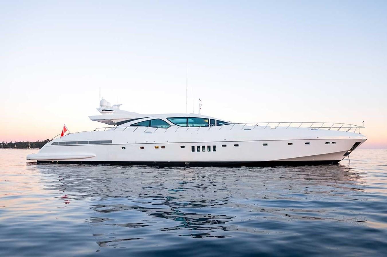 a white yacht on the water aboard BEACHOUSE Yacht for Sale