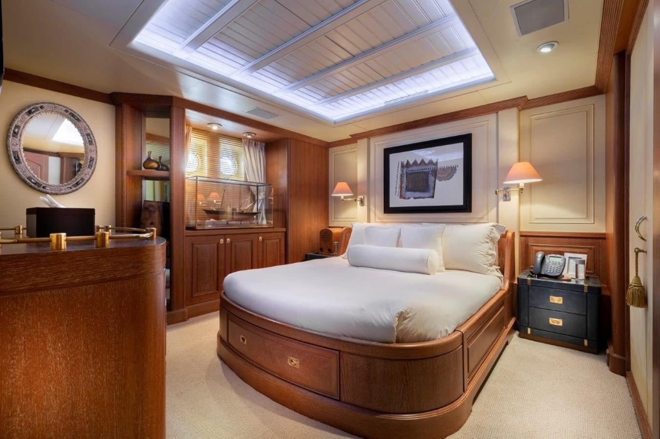 a large bedroom with a large bed aboard GLACIAL BEAR Yacht for Sale