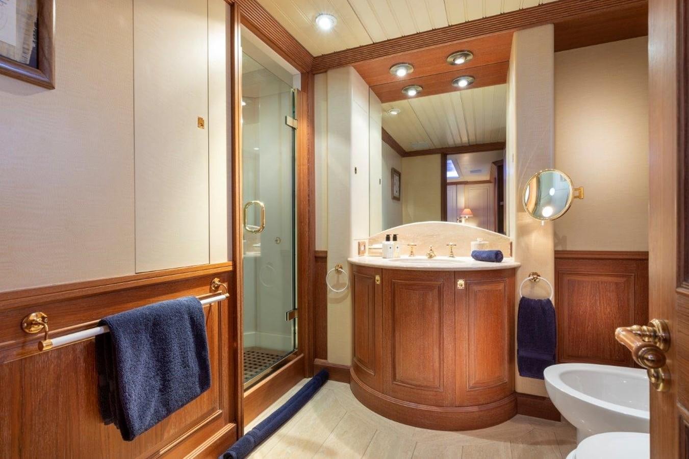 a bathroom with a large mirror aboard GLACIAL BEAR Yacht for Sale
