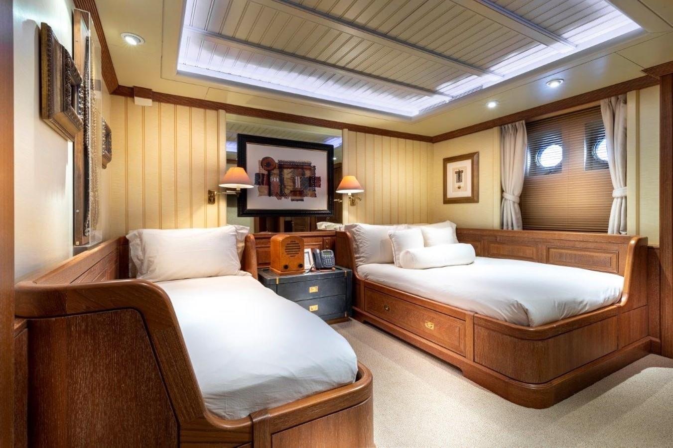 a room with two beds aboard GLACIAL BEAR Yacht for Sale