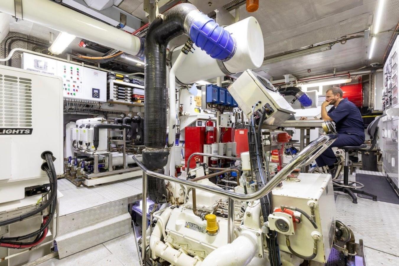 a person working in a factory aboard GLACIAL BEAR Yacht for Sale