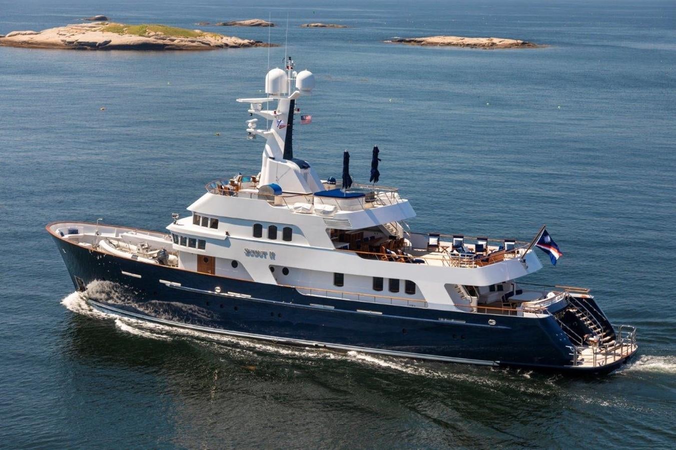 a large ship in the water aboard GLACIAL BEAR Yacht for Sale