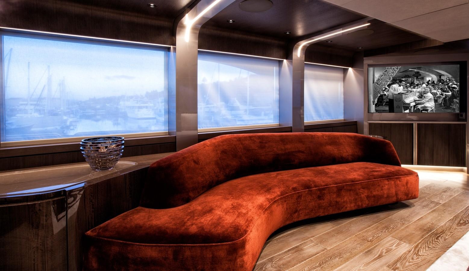 a couch in a room aboard PEPPER XIII Yacht for Sale