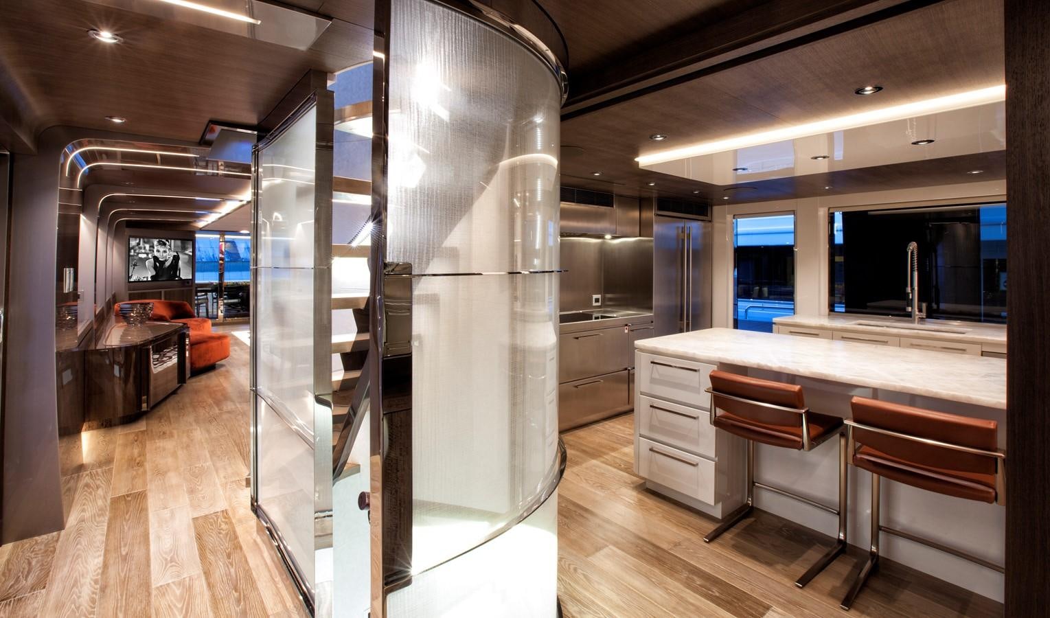a room with a large glass wall aboard PEPPER XIII Yacht for Sale
