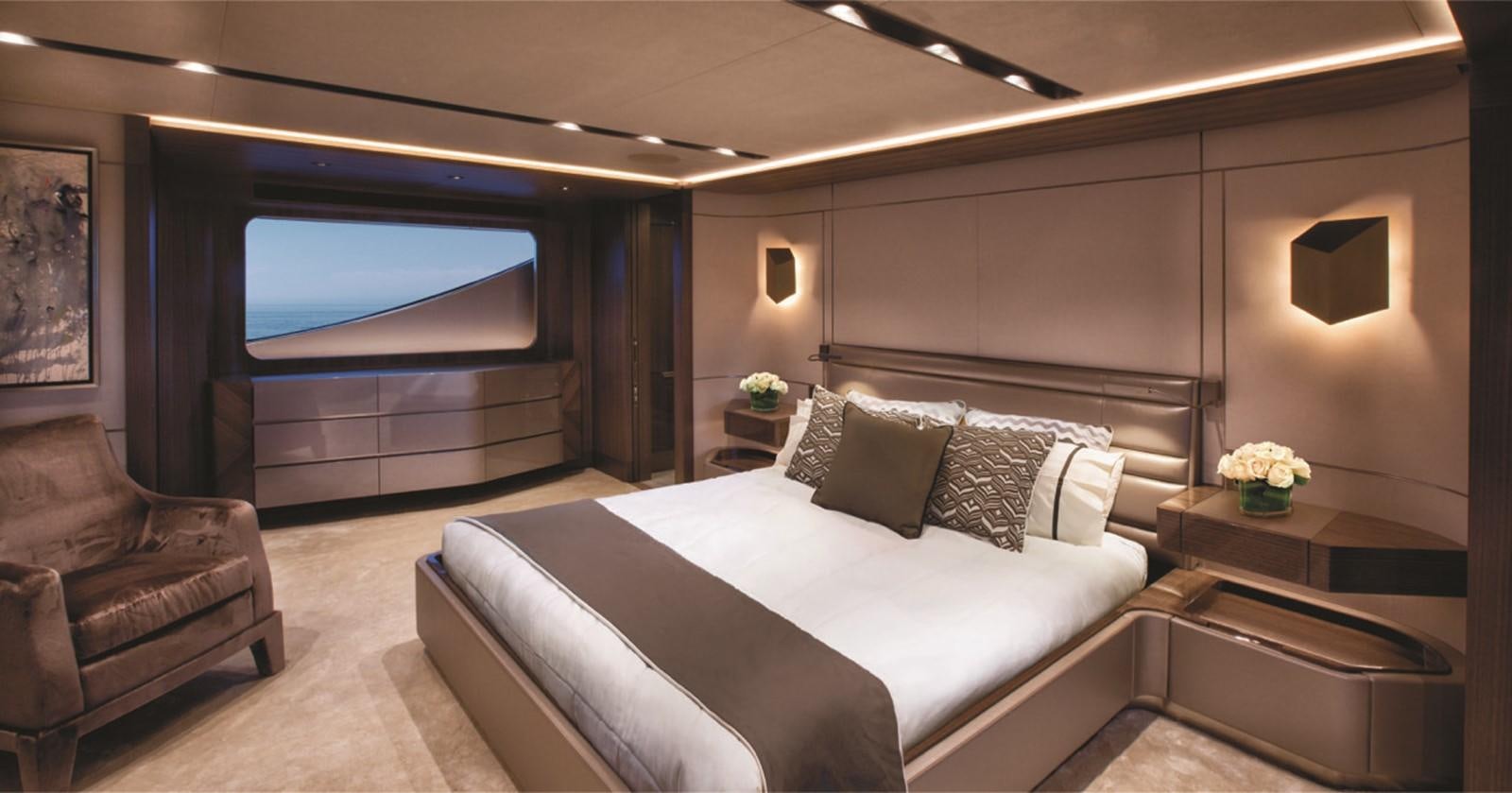 a room with a bed and a tv aboard PEPPER XIII Yacht for Sale