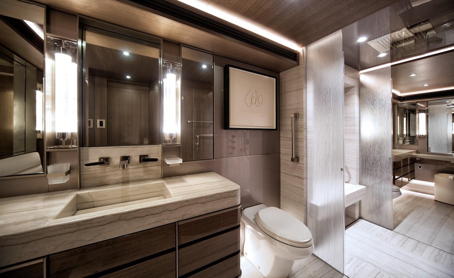 a bathroom with a large mirror aboard PEPPER XIII Yacht for Sale