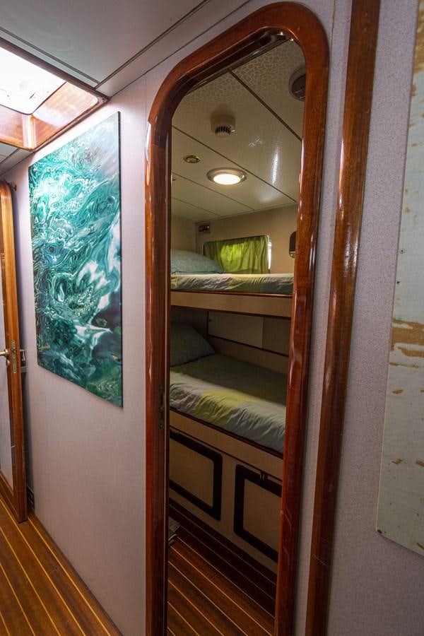 a room with a glass door aboard ELECTA Yacht for Sale