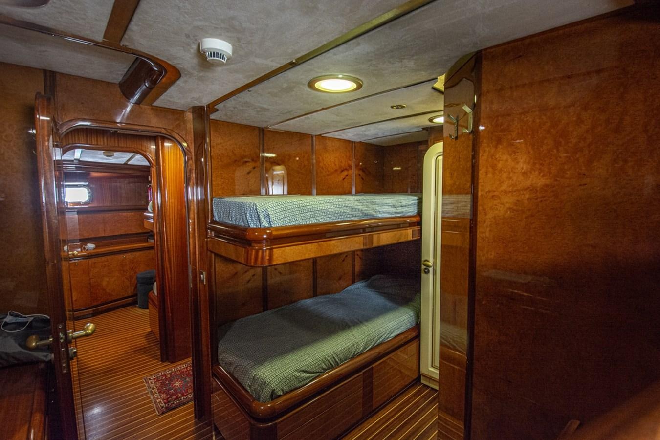 a room with bunk beds aboard ELECTA Yacht for Sale