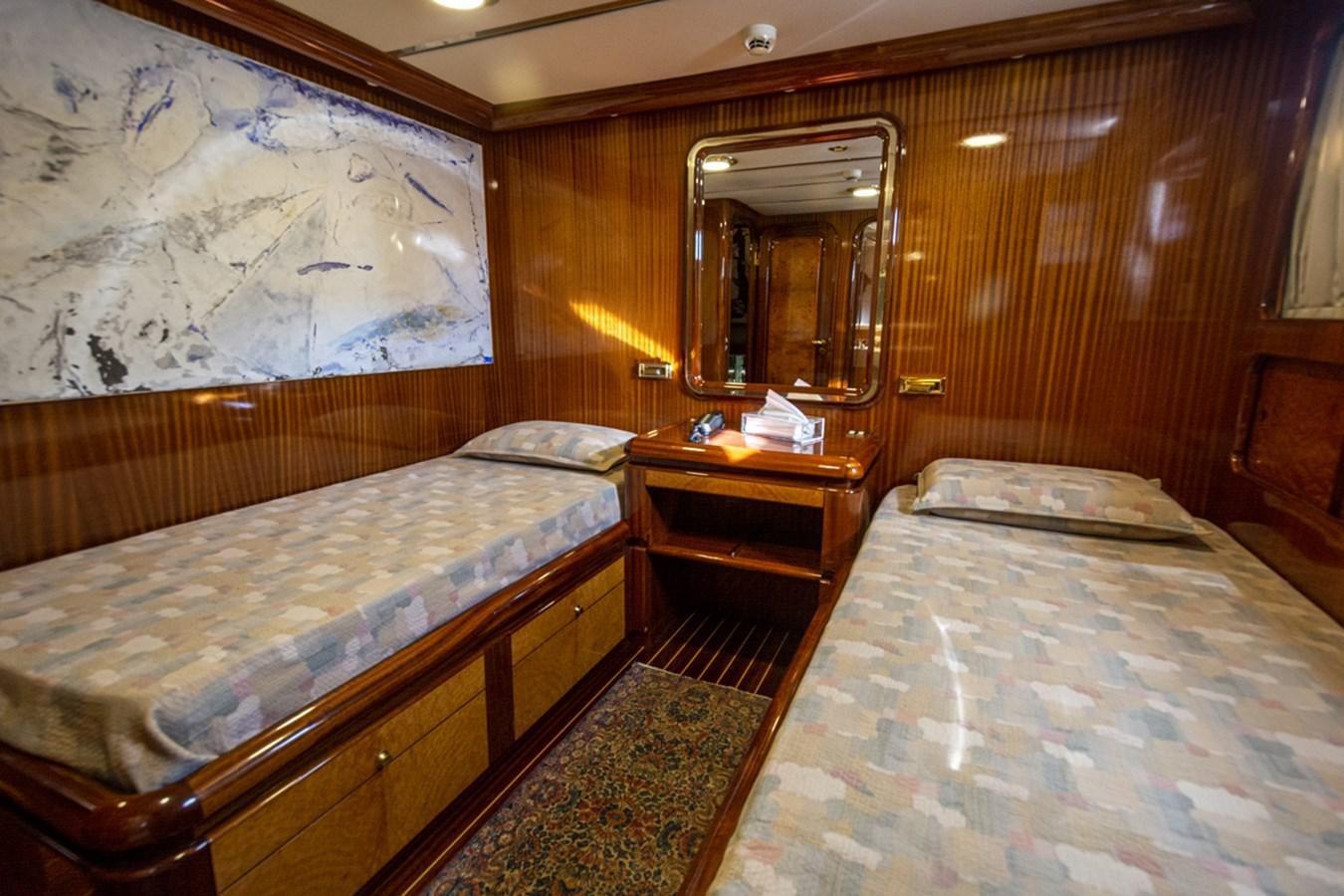 a room with two beds aboard ELECTA Yacht for Sale