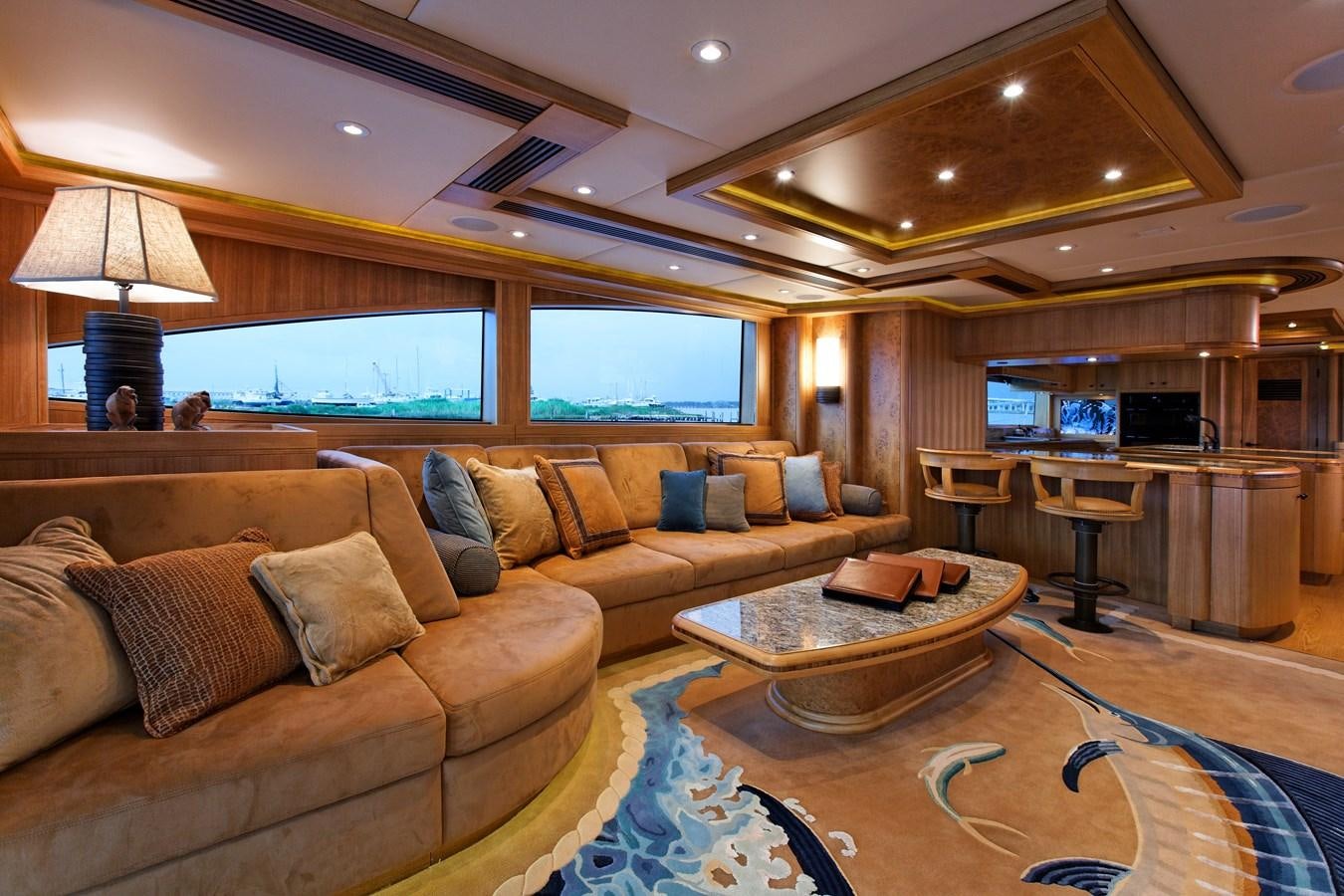 a living room with a large window aboard ATLANTIS Yacht for Sale