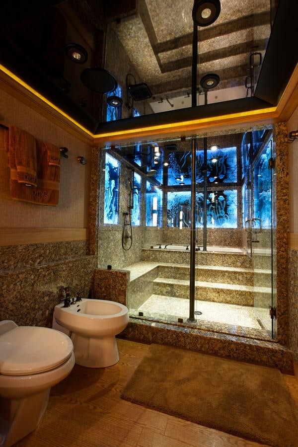 a bathroom with a glass shower aboard ATLANTIS Yacht for Sale