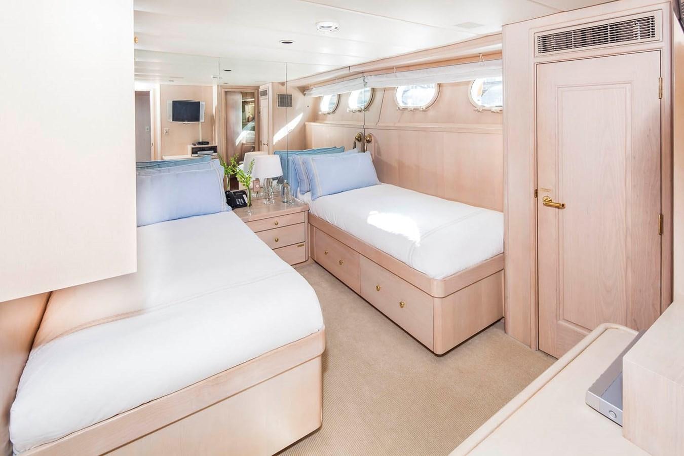 a room with two beds aboard SILENT WORLD II Yacht for Sale