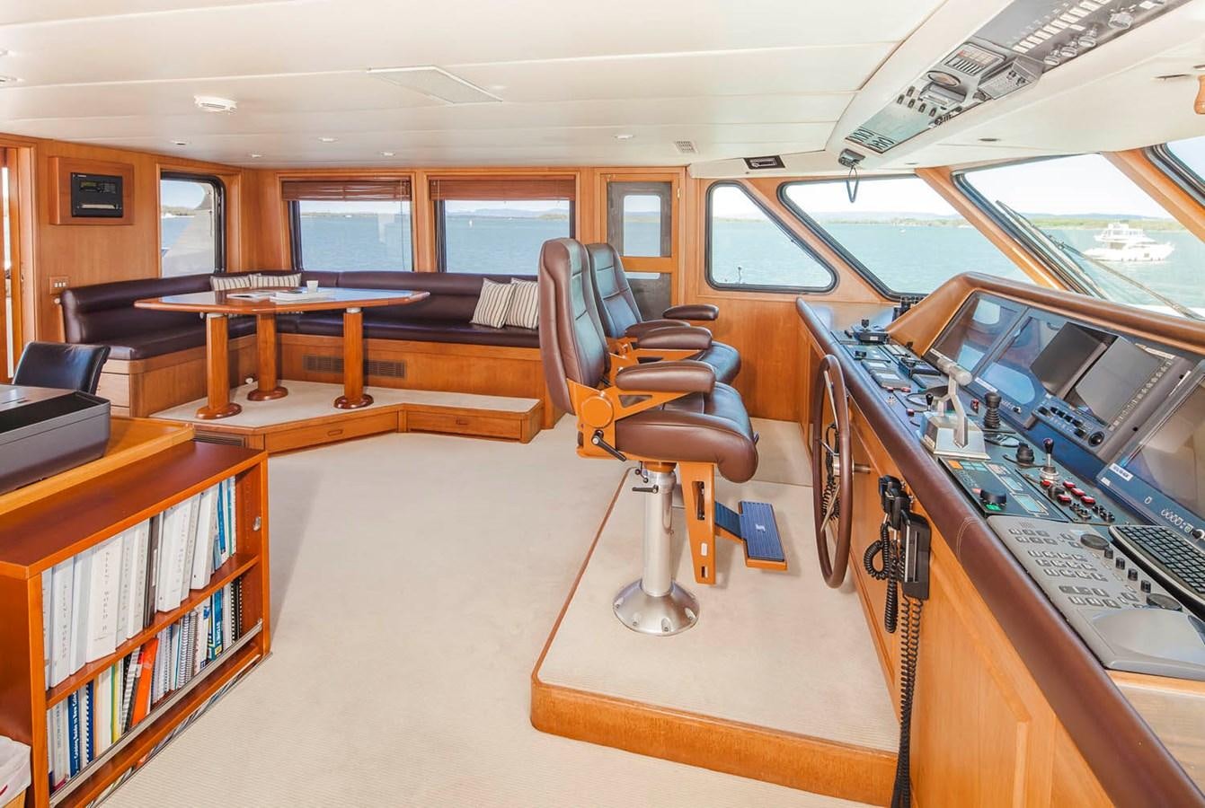 a room with a desk and a computer aboard SILENT WORLD II Yacht for Sale