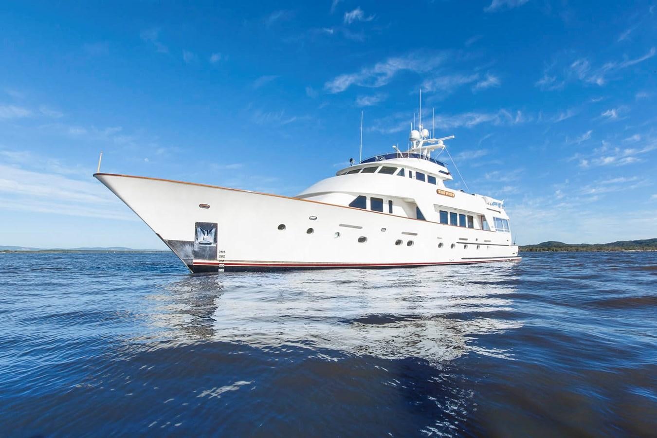 a white yacht in the water aboard SILENT WORLD II Yacht for Sale
