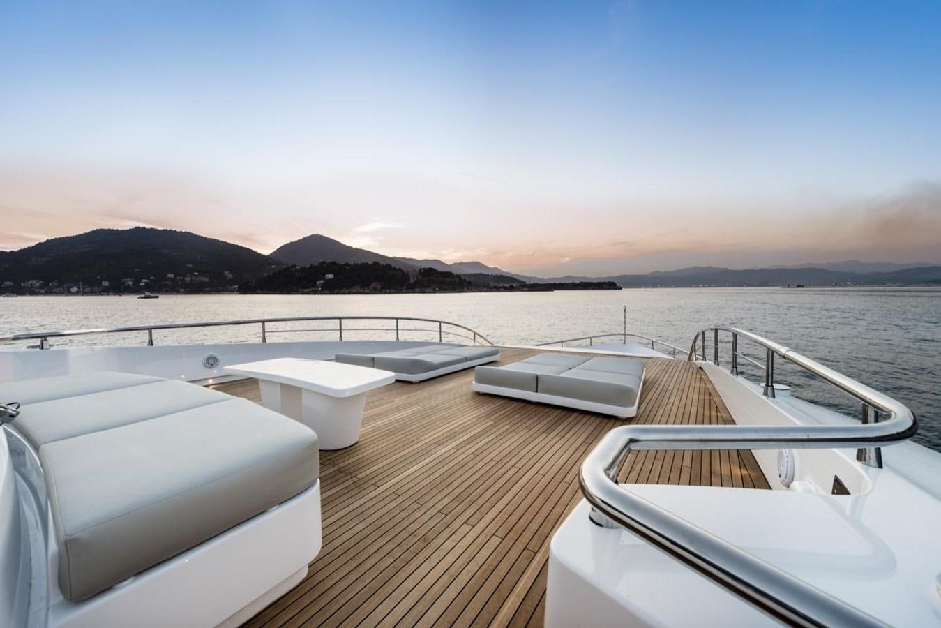 a row of boats on a dock aboard HARMONY Yacht for Sale