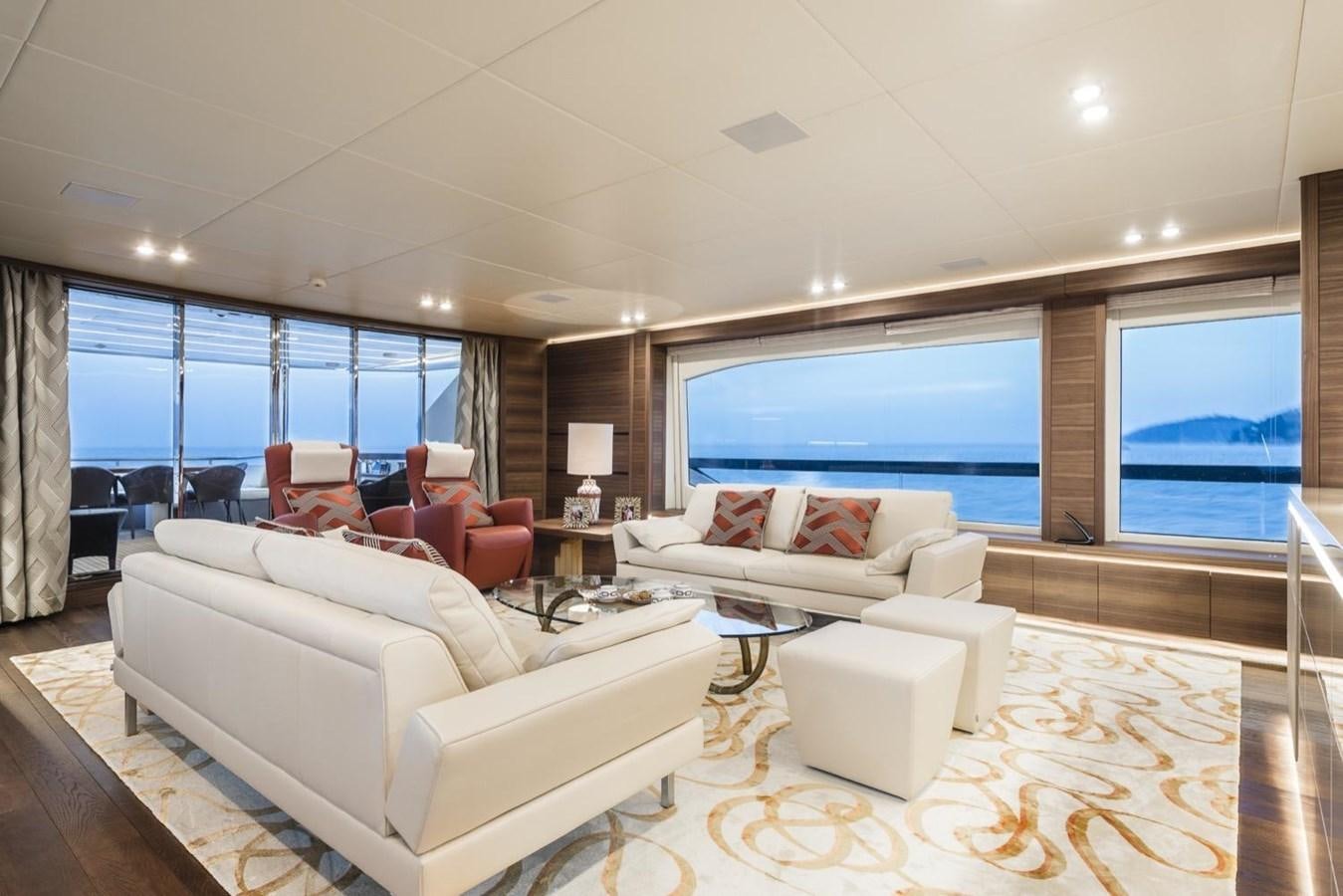 a living room with a large window aboard HARMONY Yacht for Sale