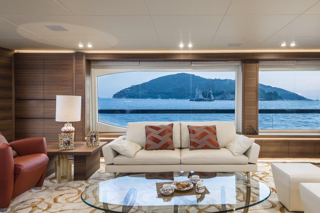 a living room with a large window aboard HARMONY Yacht for Sale