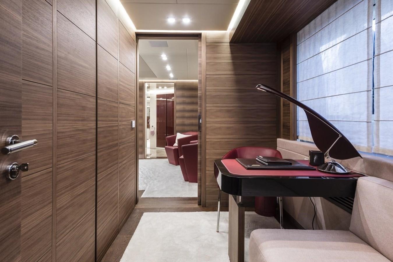 a room with a desk and a chair aboard HARMONY Yacht for Sale