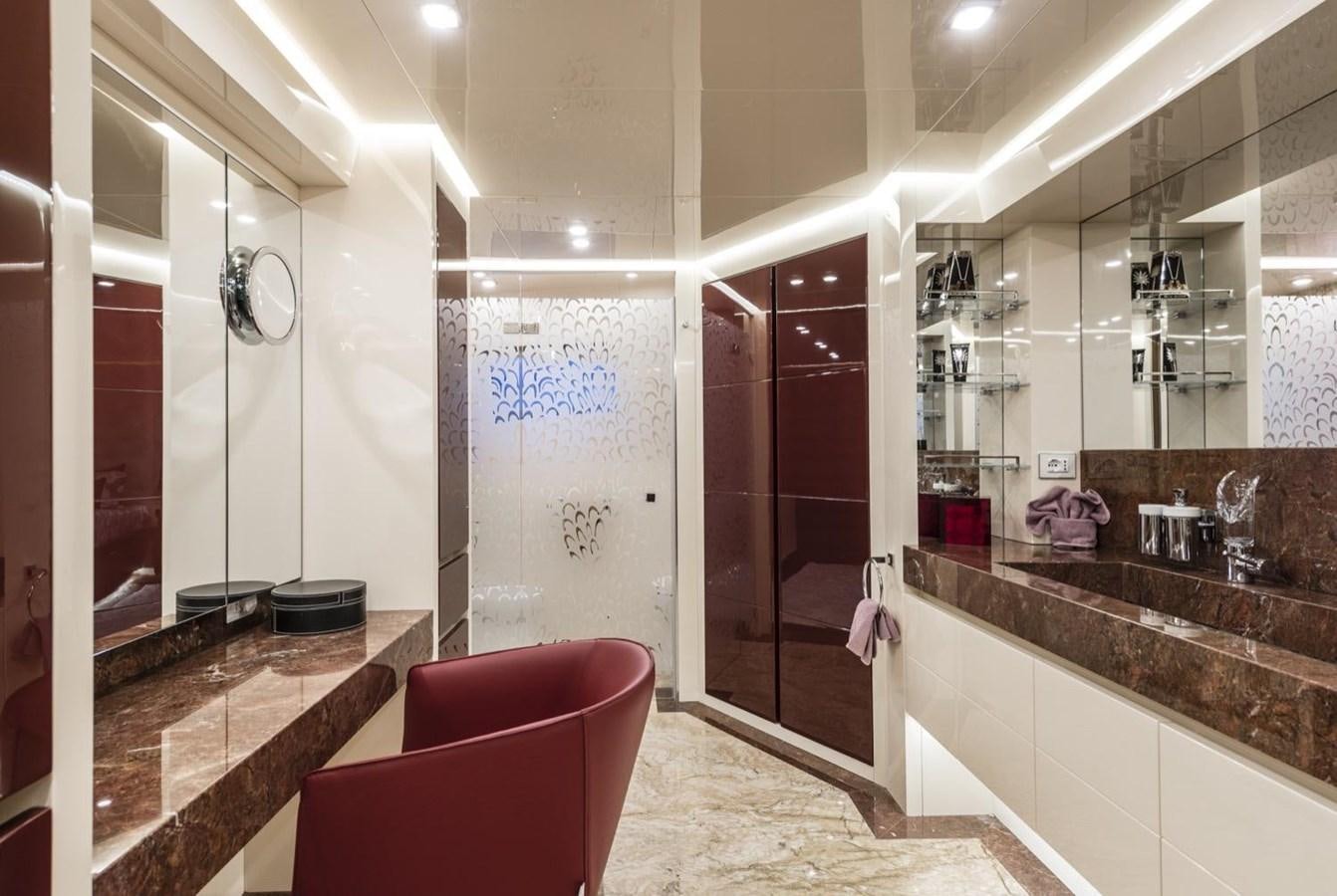 a bathroom with a counter and a sink aboard HARMONY Yacht for Sale