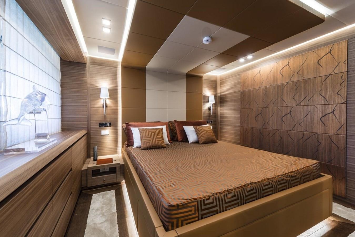 a large bed in a room aboard HARMONY Yacht for Sale