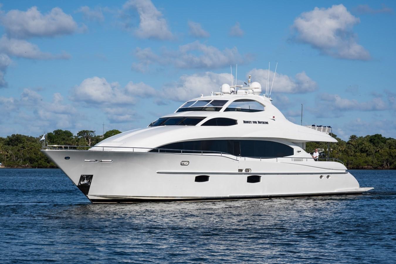 a white yacht on the water aboard MONEY FOR NOTHING Yacht for Sale