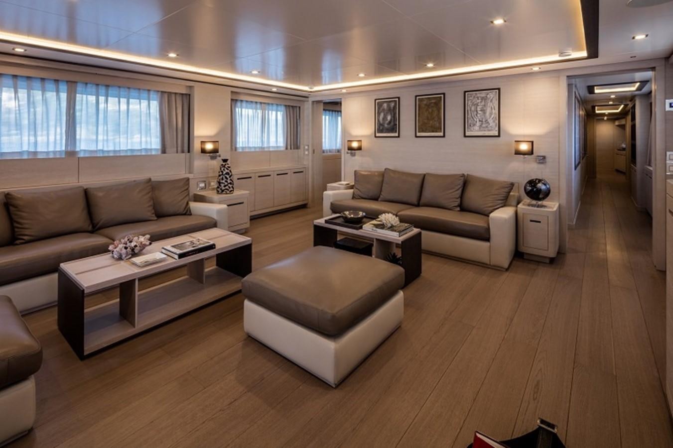 a living room with a couch and a table aboard OTAM SD35 Yacht for Sale