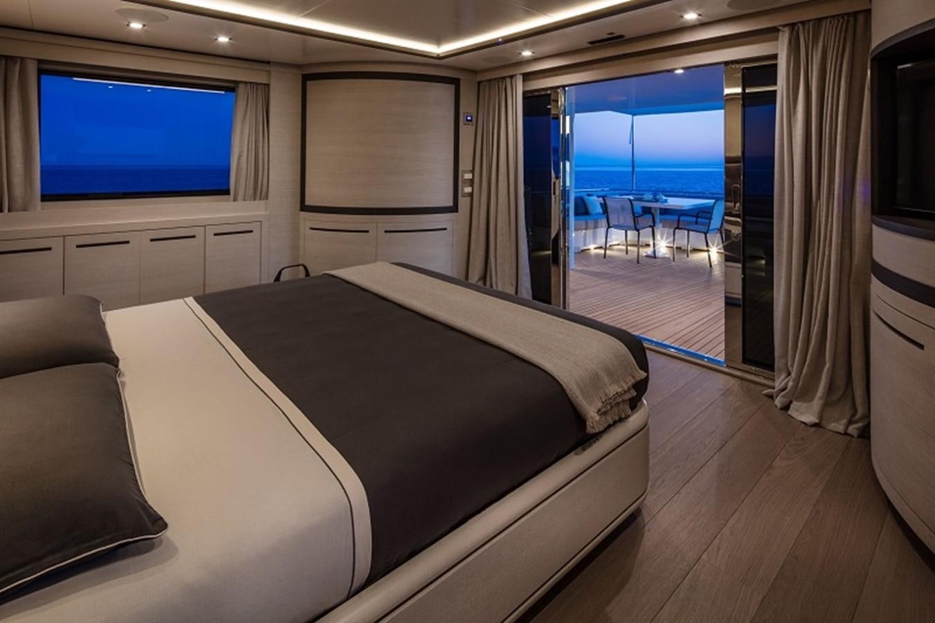 a room with a bed and a tv aboard OTAM SD35 Yacht for Sale