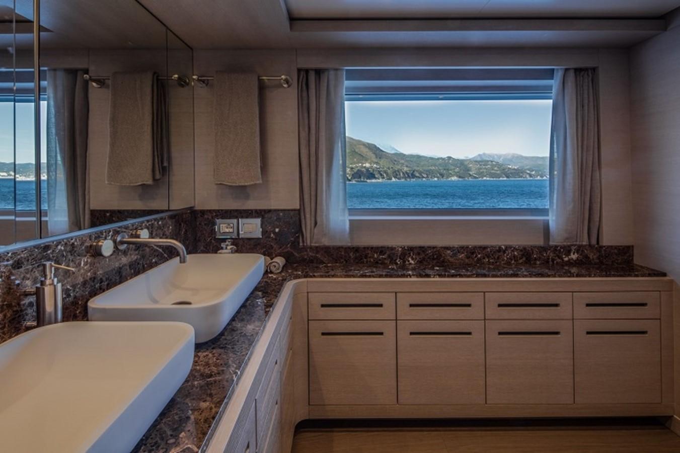 a bathroom with a large window aboard OTAM SD35 Yacht for Sale