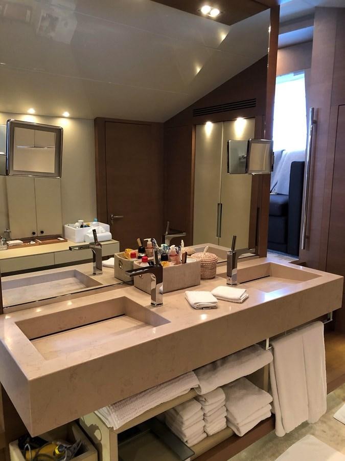 a bathroom with sinks and mirrors aboard IL GATTOPARDO Yacht for Sale