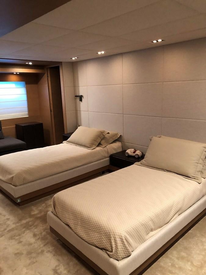 a couple of beds in a room aboard IL GATTOPARDO Yacht for Sale