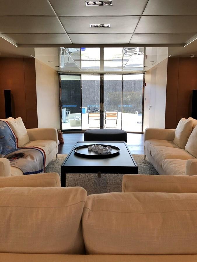 a room with couches and a table aboard IL GATTOPARDO Yacht for Sale