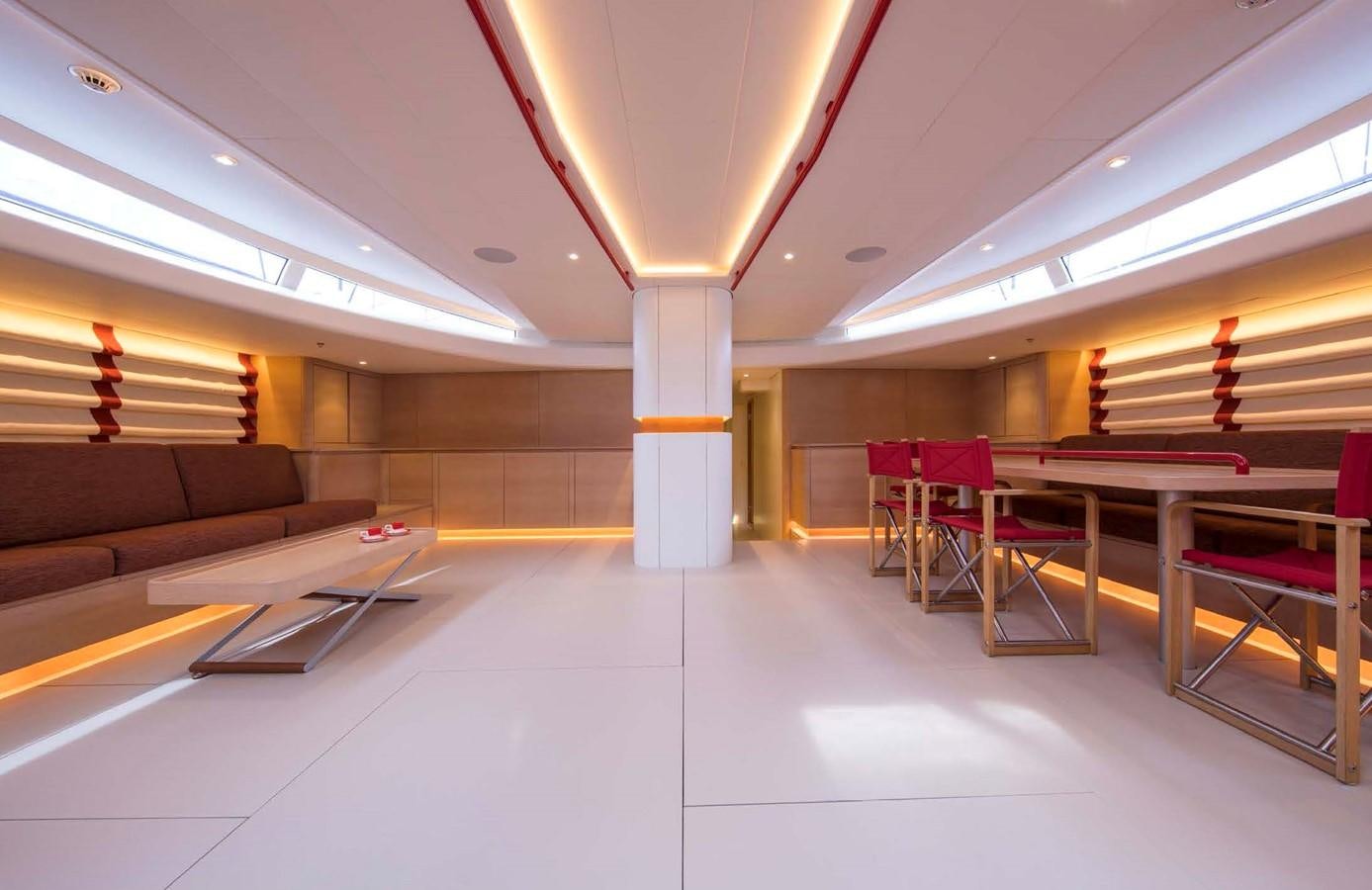 a room with tables and chairs aboard HIGHLAND FLING 15 Yacht for Sale