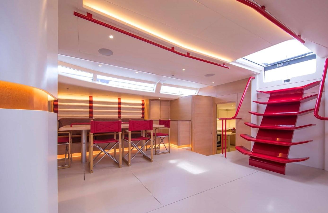 a room with chairs and a staircase aboard HIGHLAND FLING 15 Yacht for Sale