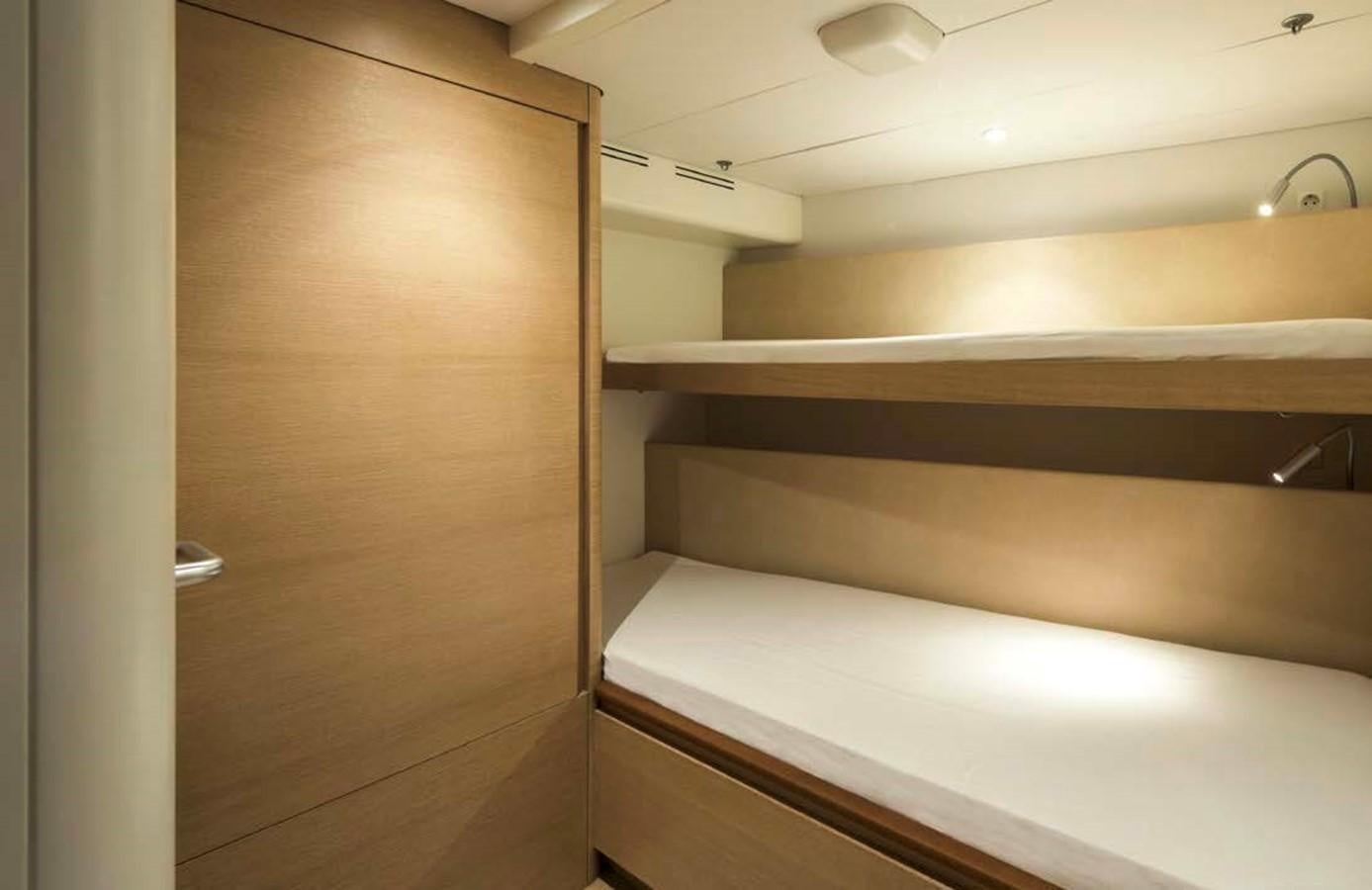 a room with a closet and a wood door aboard HIGHLAND FLING 15 Yacht for Sale