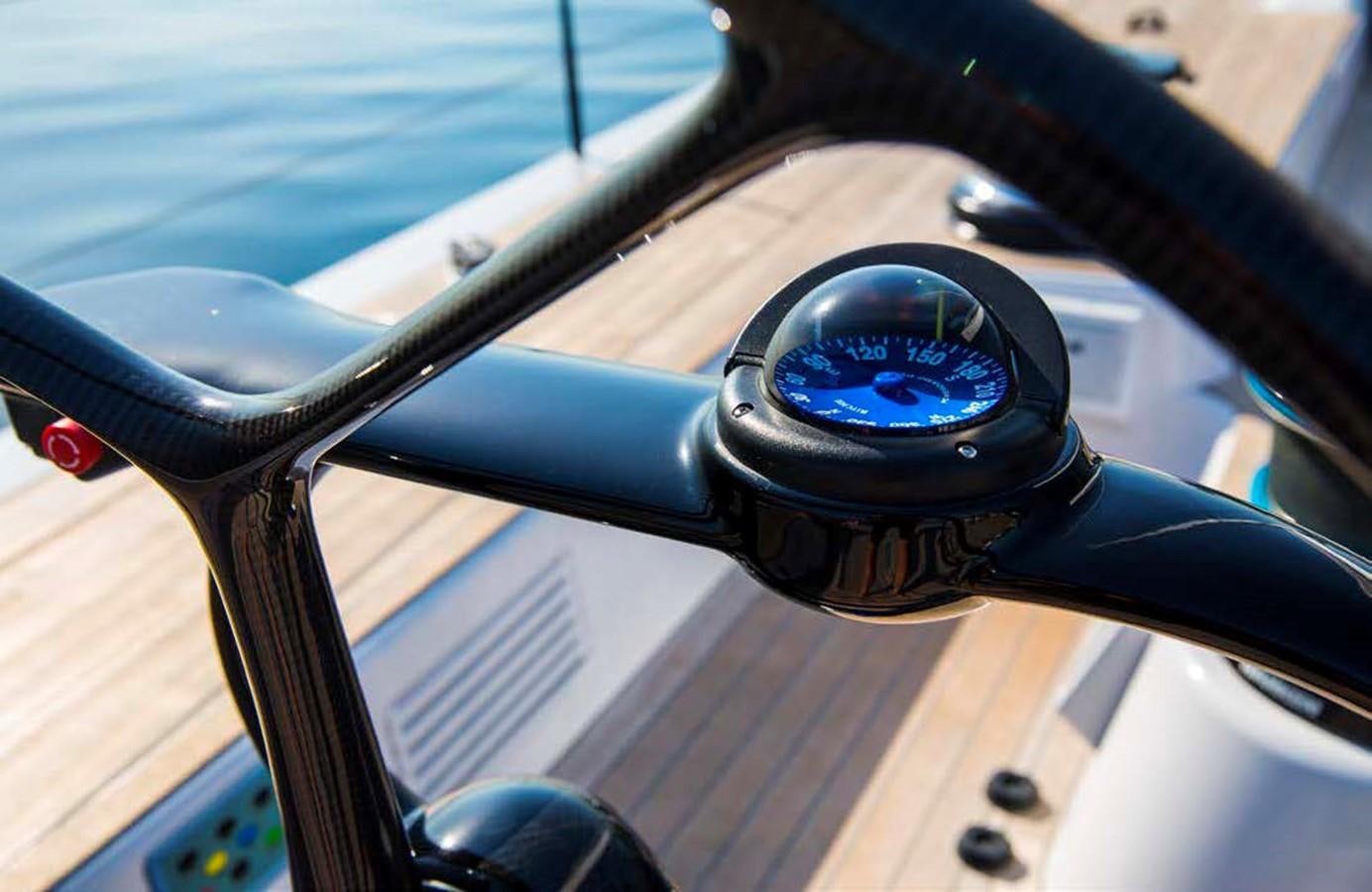 a steering wheel and dashboard of a car aboard HIGHLAND FLING 15 Yacht for Sale