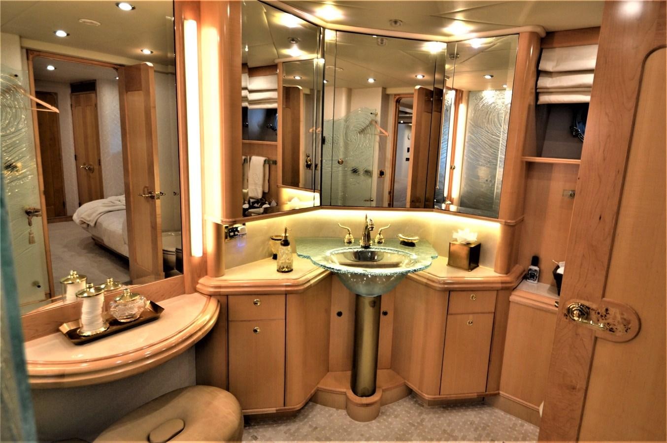 a bathroom with a sink and a mirror aboard MISS STEPHANIE  Yacht for Sale