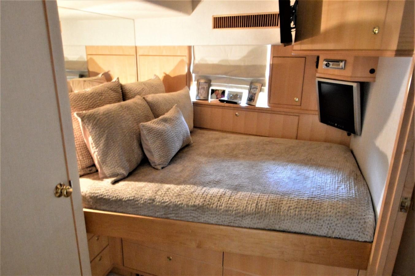 a living room with a bed aboard MISS STEPHANIE  Yacht for Sale