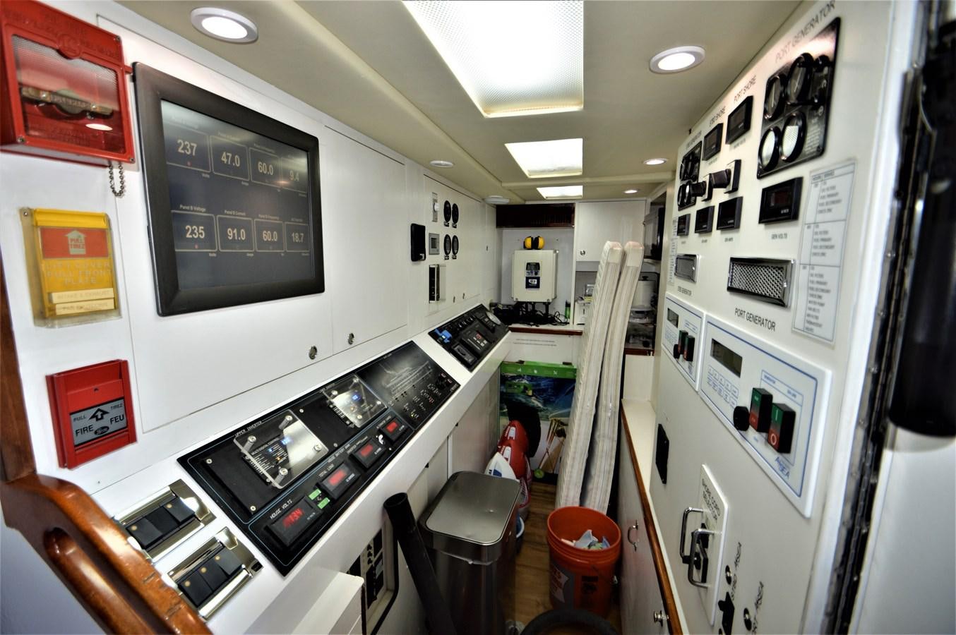 a room with a large screen aboard MISS STEPHANIE  Yacht for Sale