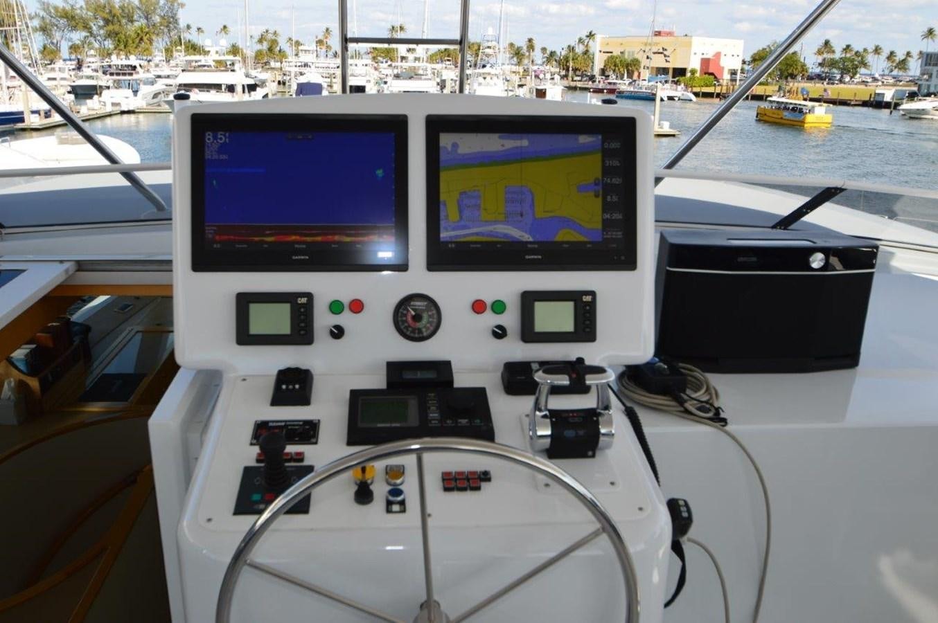 a white electronic device with a screen aboard MISS STEPHANIE  Yacht for Sale