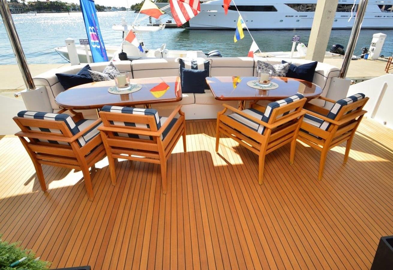 a group of chairs on a deck aboard MISS STEPHANIE  Yacht for Sale