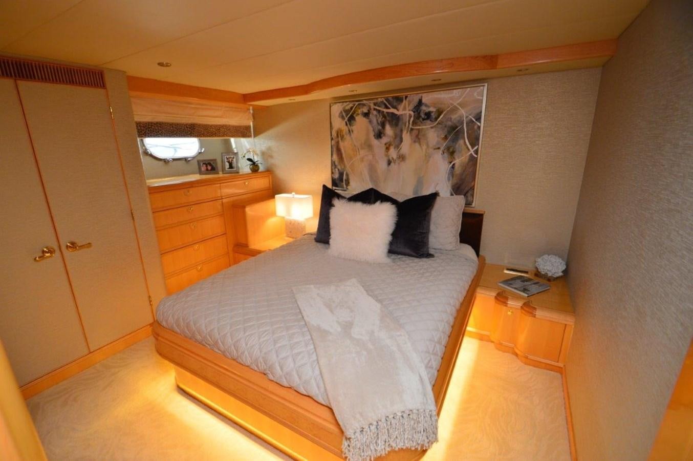 a bed in a room aboard MISS STEPHANIE  Yacht for Sale