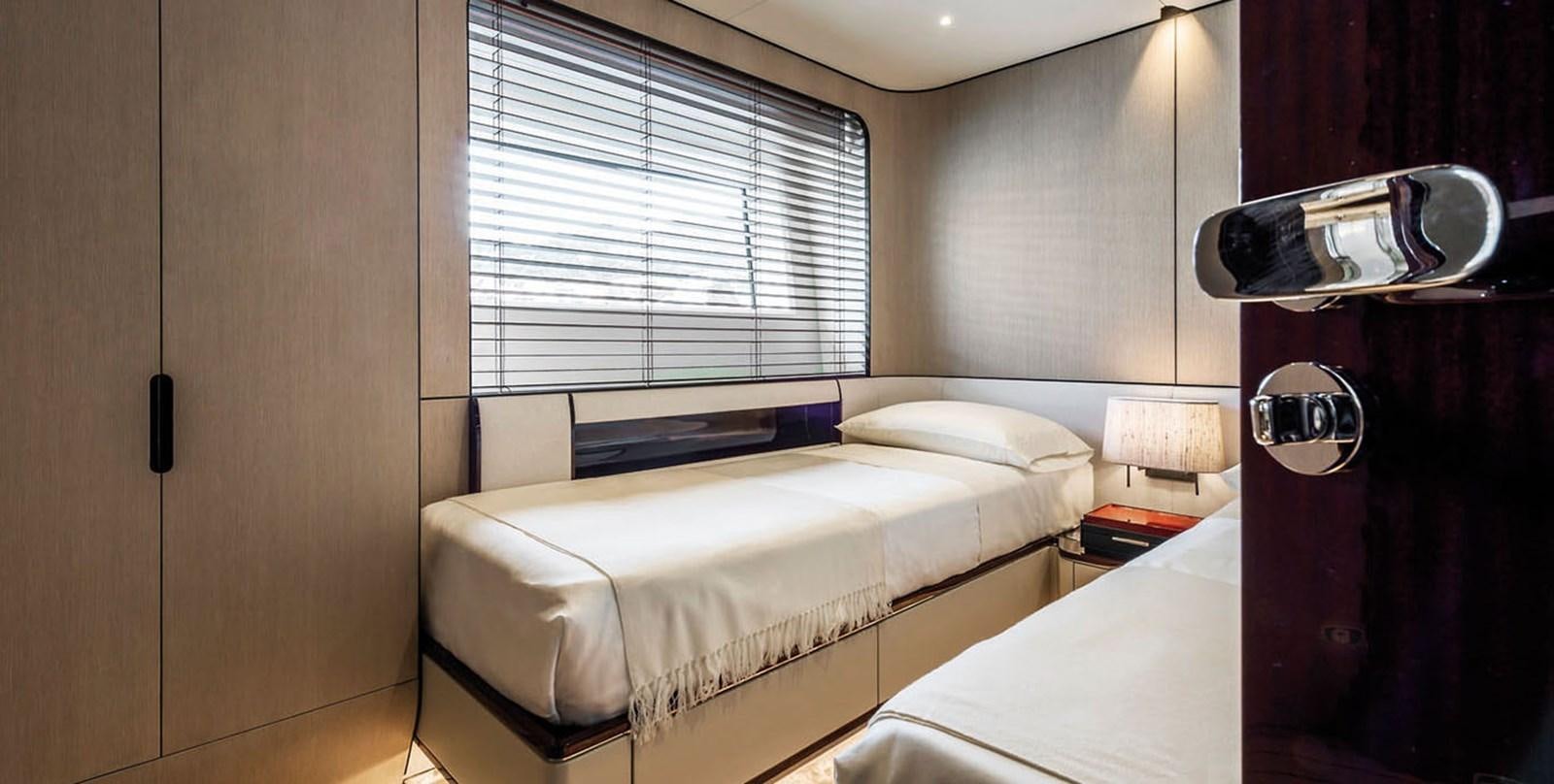 a room with two beds aboard VICIOUS RUMOUR II Yacht for Sale