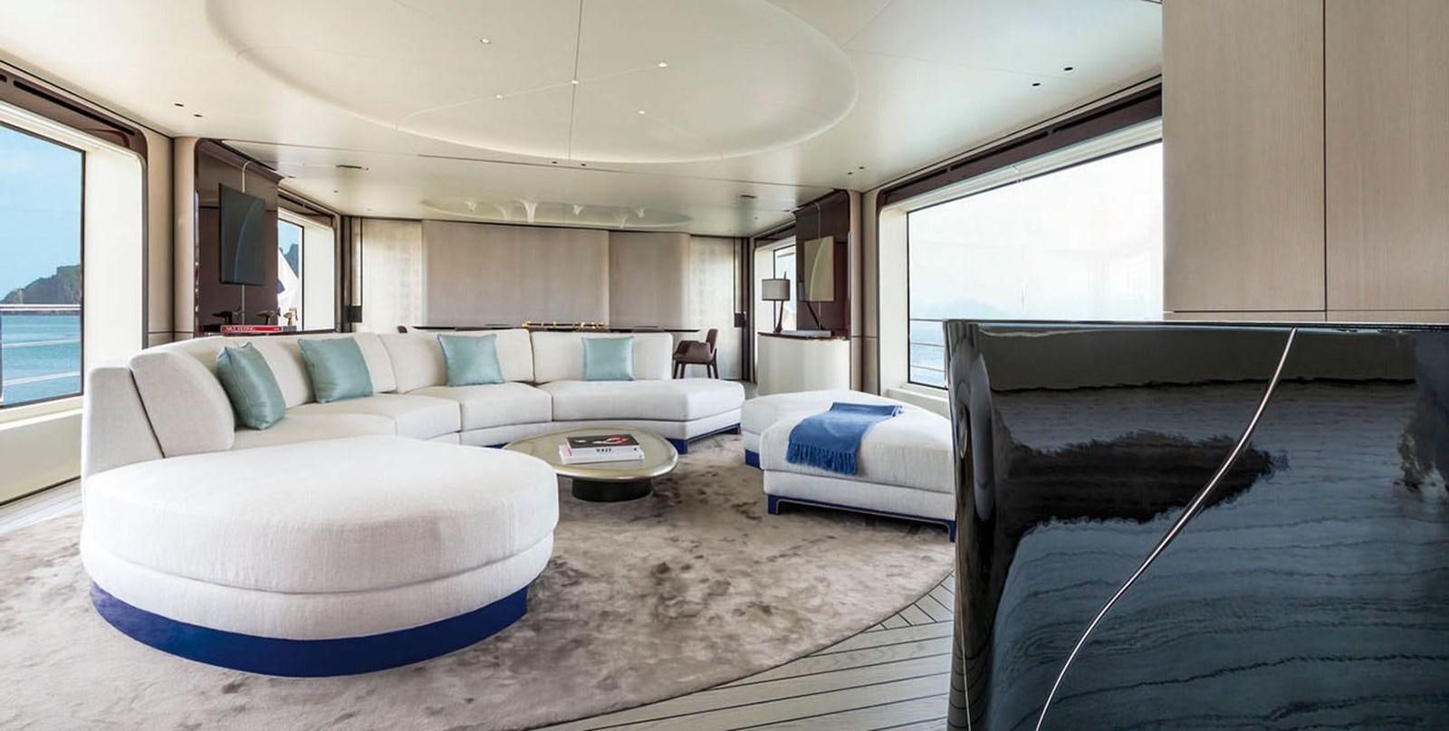 a bedroom with a bed and a couch aboard VICIOUS RUMOUR II Yacht for Sale